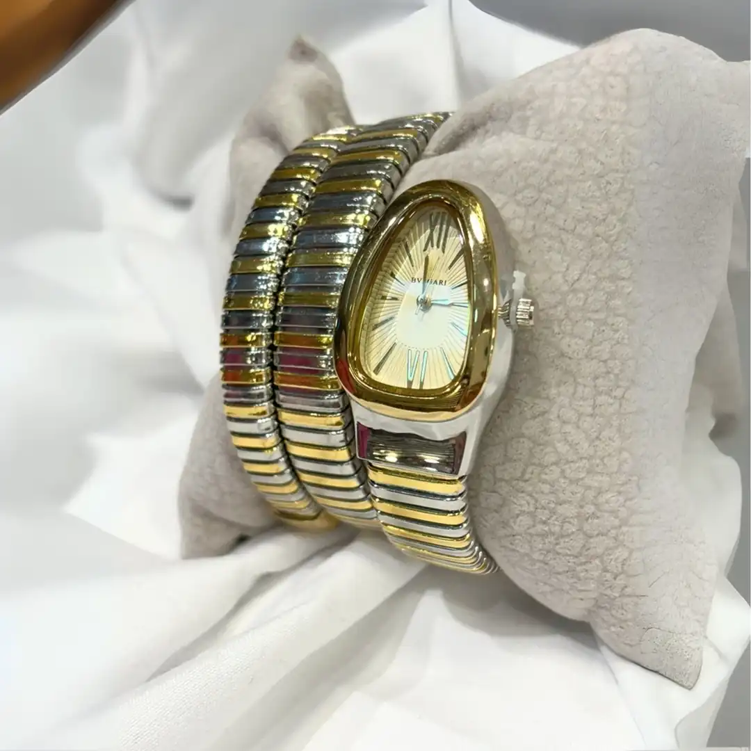 ساعة بولغري ستانلس ستيل فضي وذهبي - قلب الساعة ذهبي