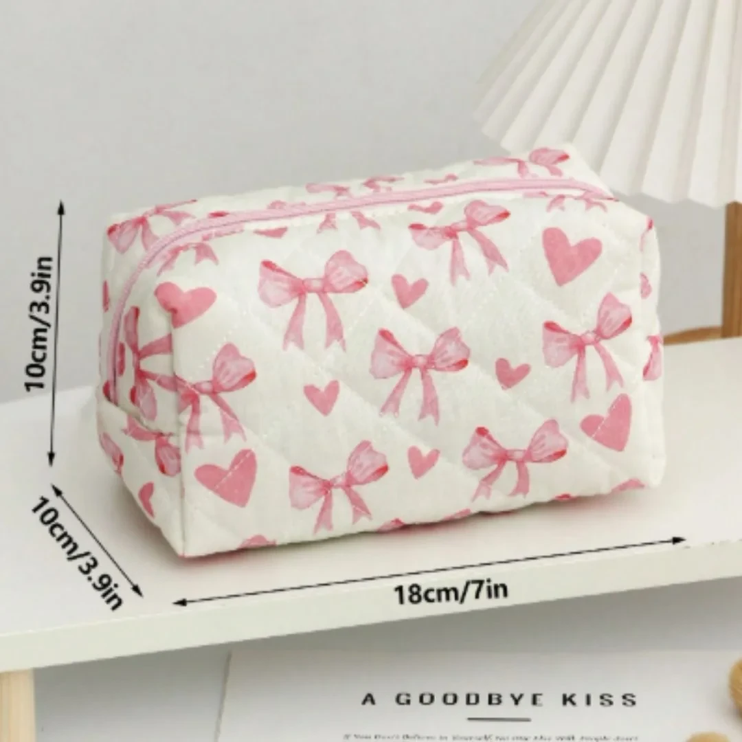 حقيبة تنظيم مستحضرات التجميل الوردية بتصميم القلب والفيونكة